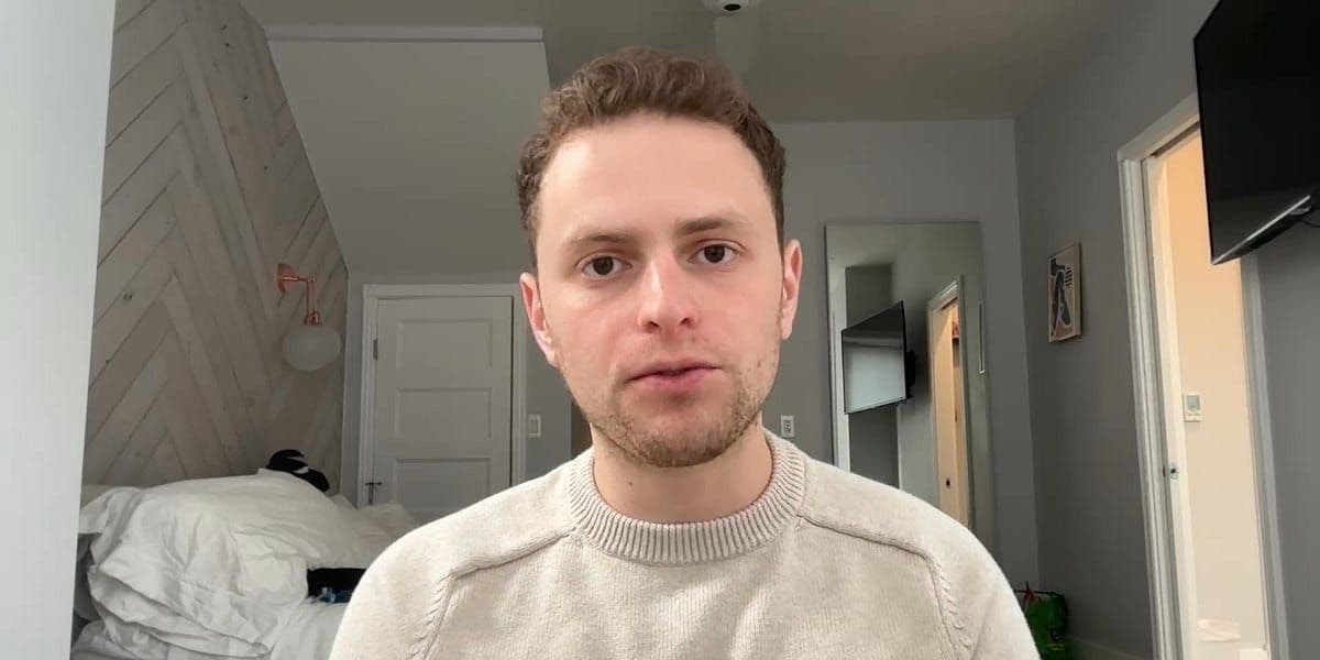 Stock market trading screens showing declining numbers amid economic uncertainty from tariff policies