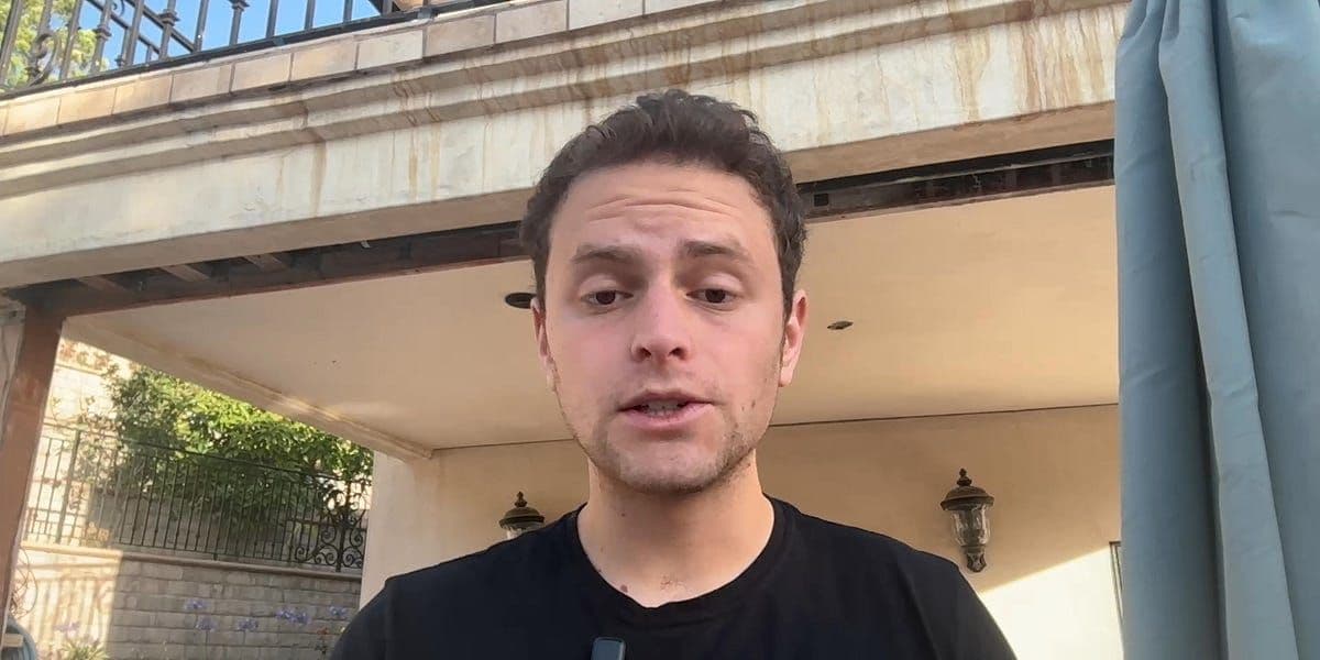 U.S. and Iran flags facing off, representing escalating military tensions between the two nations