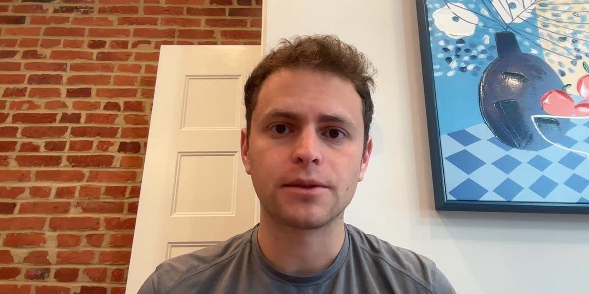 CBS News logo and headquarters representing the network's potential settlement with President Trump