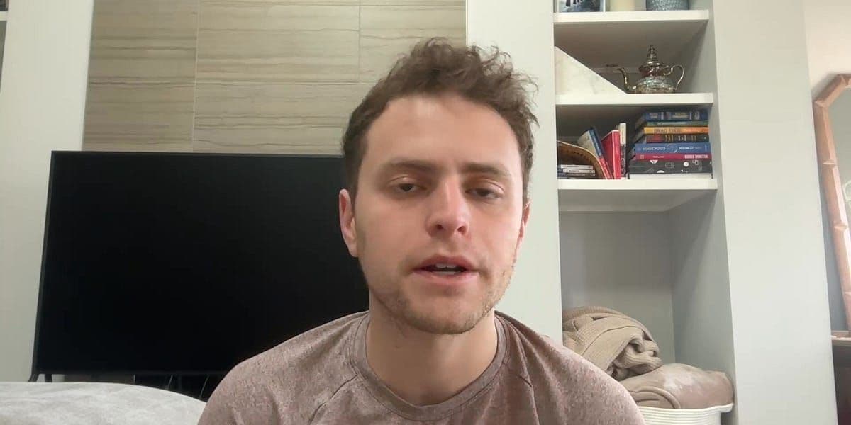 President Donald Trump speaking, with news of missing soldiers, HHS layoffs, and Tesla sales decline in the background