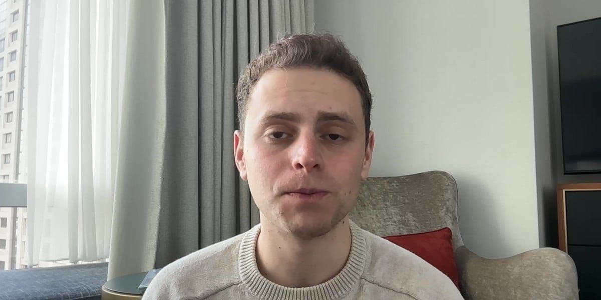 Stock market graph showing sharp decline with Tesla logo, representing economic turmoil and Tesla's plunging value